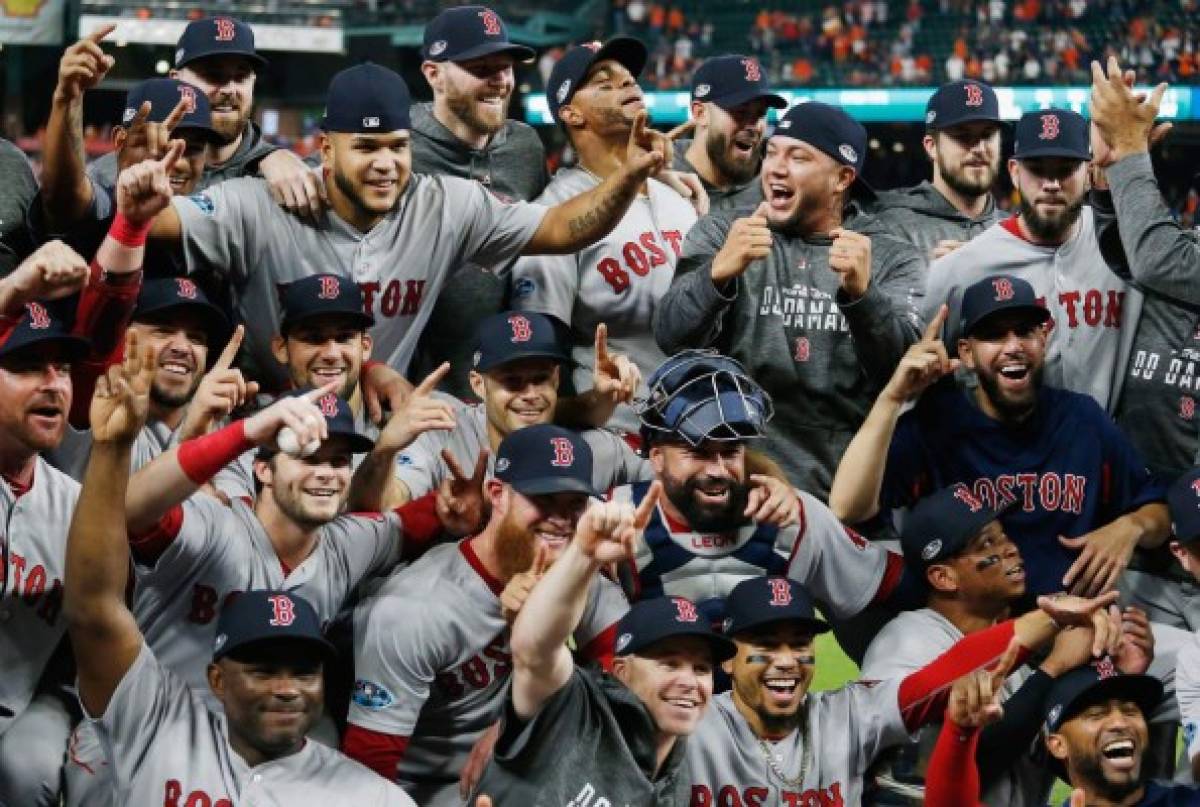 HOUSTON, TX - OCTOBER 18: The Boston Red Sox celebrate defeating the Houston Astros 4-1 in Game Five of the American League Championship Series to advance to the 2018 World Series at Minute Maid Park on October 18, 2018 in Houston, Texas. Bob Levey/Getty Images/AFP