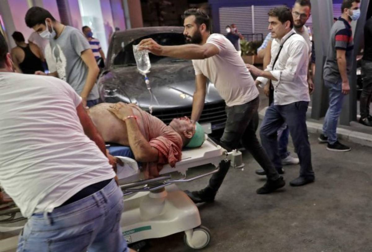 Lágrimas y muertos: Las impactantes nuevas imágenes de las explosiones en Beirut, Líbano