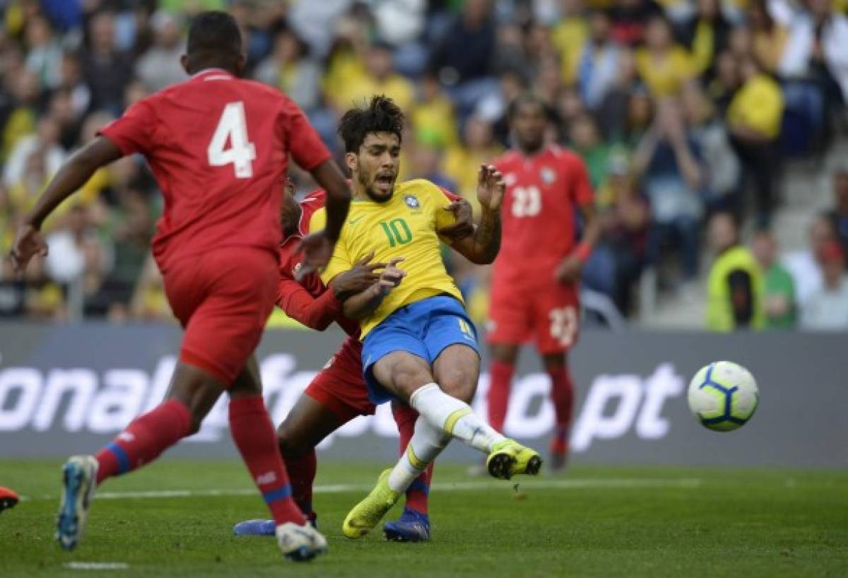 Brazil's midfielder Lucas Paqueta kicks the ball during an international friendly football match between Brazil and Panama at the Dragao stadium in Porto, on March 23, 2019 in preparation for the Copa America to be held in Brazil in June and July 2019. (Photo by MIGUEL RIOPA / AFP)