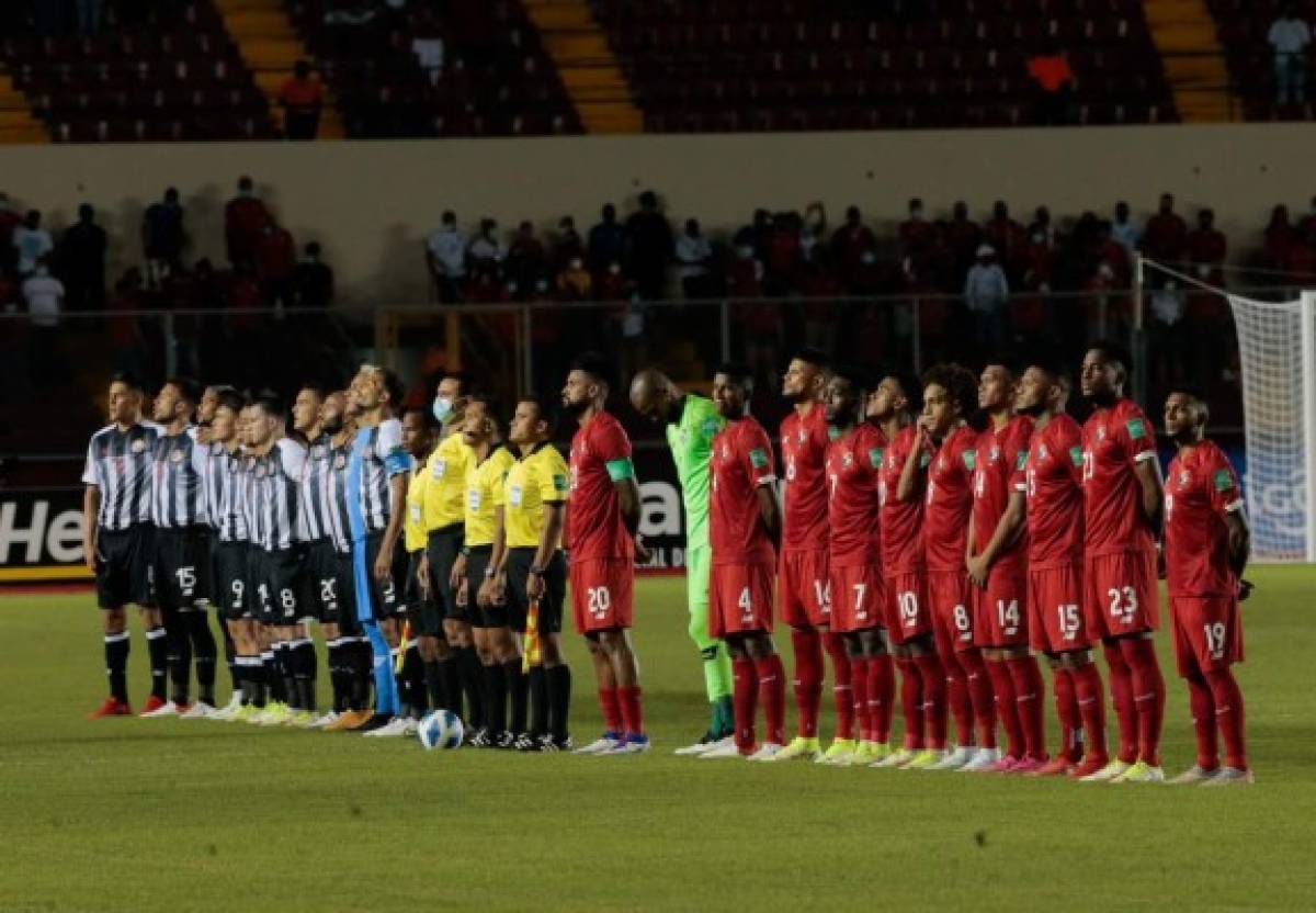Costa Rica's national team (left) and Panama's national team (right) during the national anthem during their CONCACAF 2022 FIFA World Cup Qatar 2022 qualifying match at the Rommel Fernandez stadium in Panama City, Panama, Sept. 2, 2021. (Photo by ROGELIO FIGUEROA / STR / AFP)