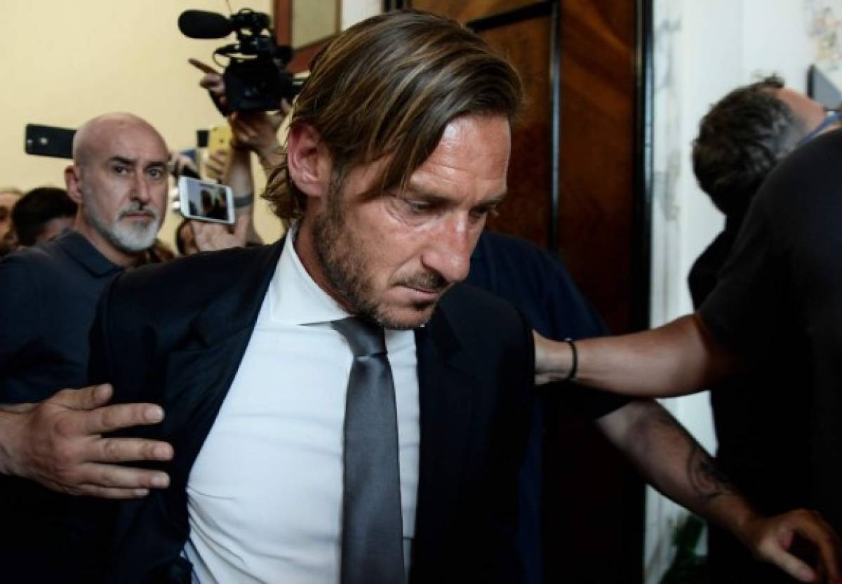 Italian former professional footballer and current technical director at AS Roma, Francesco Totti leaves after holding a press conference on June 17, 2019 at the Foro Italico sports complex in Rome. - Totti, who played for Roma and the Italy national team, announced on June 17 he is stepping down from his role as technical director at Roma after 30 years at the club. (Photo by Filippo MONTEFORTE / AFP)