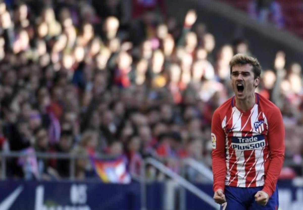 Atletico Madrid's French forward Antoine Griezmann shouts during the Spanish league football match between Club Atletico de Madrid vs Athletic Club Bilbao at the Wanda Metropolitano stadium in Madrid on February 18, 2018. / AFP PHOTO / GABRIEL BOUYS