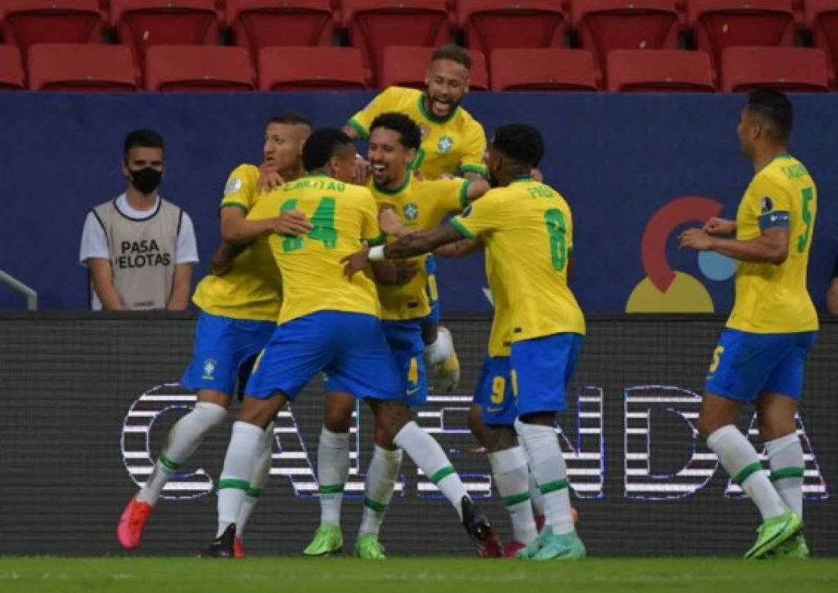 Marquinhos abrió el marcador ante Venezuela en el estadio Mané Garrincha.