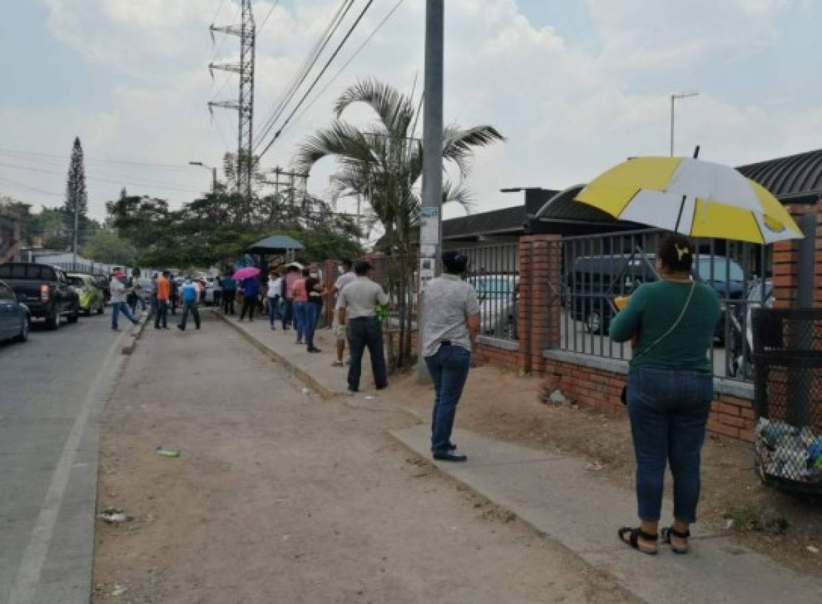 Fotos: Bancos y mercados abarrotados en plena crisis de coronavirus en Honduras