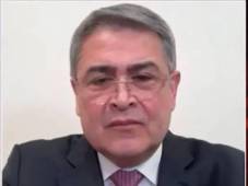 Juan Orlando Hernández al momento de la entrevista con el medio OANN. Foto captura de imagen.