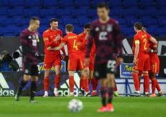 Wales' midfielder Kieffer Moore (2L) celebrates scoring the opening goal during the international friendly football match between Wales and Mexico at Cardiff City Stadium in Cardiff on March 27, 2021. (Photo by GEOFF CADDICK / AFP)