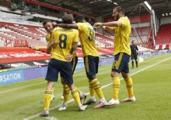 Jugadores de Arsenal celebrando una de sus anotaciones ante Sheffield United.
