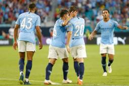 MIAMI, FL - JULY 28: Brahim Diaz #55 of Manchester City celebrates with Bernardo Silva #20 after his goal against Bayern Munich in the first half of the International Champions Cup at Hard Rock Stadium on July 28, 2018 in Miami, Florida. Michael Reaves/Getty Images/AFP