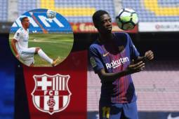Barcelona's new player Ousmane Dembele plays with a ball as he poses at the Camp Nou stadium in Barcelona, during his official presentation by the Catalan football club, on August 28, 2017.French starlet Ousmane Dembele agreed a five-year deal with Barcelona worth 105 million euros ($125 million) plus add-ons. Dembele, 20, moves from Borussia Dortmund, where he has been suspended since he boycotted training on August 10 in protest after the German club rejected Barca's first bid. / AFP PHOTO / LLUIS GENE