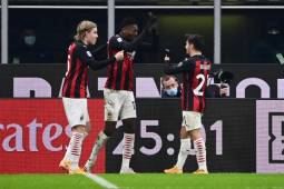 AC Milan's Portuguese forward Rafael Leao celebrates with teammates after scoring a goal during the Italian Serie A football match between AC Milan and Torino on January 9, 2021 at the San Siro stadium in Milan. (Photo by MIGUEL MEDINA / AFP)