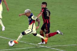 ORLANDO, FL - DECEMBER 16: Leonardo Suarez #7 of Club America runs past Emerson Hyndman #16 of Atlanta United during the CONCACAF Champions League quarterfinal game at Exploria Stadium on December 16, 2020 in Orlando, Florida. Alex Menendez/Getty Images/AFP
