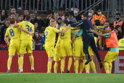 Futbolistas del Cádiz celebrando su anotación ante Barcelona en el Camp Nou.
