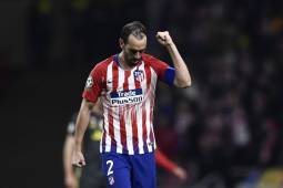 Atletico Madrid's Uruguayan defender Diego Godin celebrates after scoring his team's second goal during the UEFA Champions League round of 16 first leg football match between Club Atletico de Madrid and Juventus FC at the Wanda Metropolitan stadium in Madrid on February 20, 2019. (Photo by OSCAR DEL POZO / AFP)