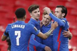 England's midfielder James Ward-Prowse (2R) celebrates scoring the opening goal during the FIFA World Cup Qatar 2022 qualification football match between England and San Marino at Wembley Stadium in London on March 25, 2021. (Photo by Frank Augstein / POOL / AFP) / NOT FOR MARKETING OR ADVERTISING USE / RESTRICTED TO EDITORIAL USE