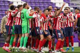 El Atlético de Madrid celebrando la conquista de la Liga Española tras vencer al Valladolid en la última jornada del campeonato. Fotos AFP