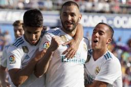Benzema festejando su tanto con Asensio y Lucas Vázquez.