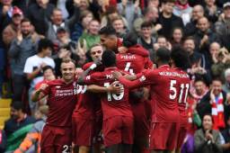 Los jugadores del Liverpool celebran uno de los tres tantos ante Southampton.