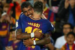 Paulinho y Messi festejando juntos en el Barcelona.