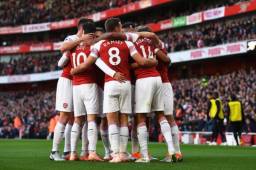 Los jugadores del Arsenal celebran uno de sus goles ante el Everton.