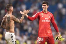 Courtois y Ramos luego del derbi madrileño ante el Atlético.