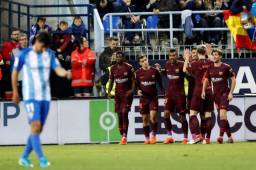El Barcelona no extrañó mucho a Messi y sumó de tres ante el Málaga que se hunde en la Liga.