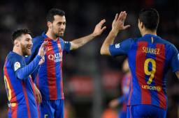 Leo Messi y Luis Suárez festejan en el Camp Nou ante Sporting Gijón.