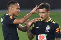 Neymar y Coutinho durante un entrenamiento con la Selección de Brasil.