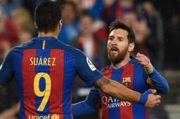 Messi celebrando junto a Luis Suáre con el Barcelona.