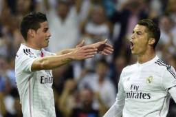 James Rodríguez celebrando un tanto junto a Cristiano Ronaldo.