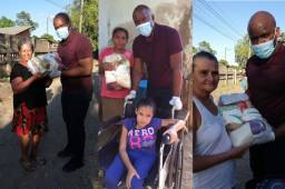 El defensor Osman Chávez se solidarizó con un niña con retos especiales en Cofradía y entregó víveres a los más necesitados. Foto Jimmy Barahona