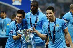 Samir Nasri (derecha) junto a Yaya Toureé (centro) y Jesús Navas (izquierda) en el Manchester City.