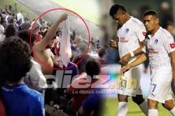 El aficionado del Olimpia quemando la camisa en el sector de populares del estadio Nacional tras la eliminación a manos del Honduras Progreso.