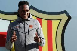 El central colombiano Yerry Mina, que este sábado será presentado como nuevo jugador barcelonista, ya ejerce como azulgrana. Foto AFP