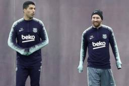 Suárez y Messi durante el entrenamiento del Barcelona antes de viajar a Italia.