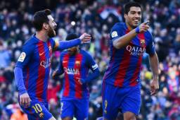 Messi celebrando junto a Luis Suárez.