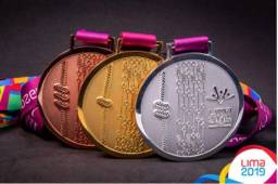 Hermosas lucen las medallas que recibirán los atletas que lleguen al podio del torneo.