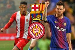 Girona's Colombian defender Bernardo Espinosa (C) tackles Barcelona's Argentinian forward Lionel Messi during the Spanish league football match between FC Barcelona and Girona FC at the Camp Nou stadium in Barcelona on September 23, 2018. / AFP PHOTO / Pau Barrena