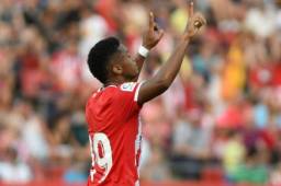 Archivo: Lozano celebrando uno de sus goles con el Girona.