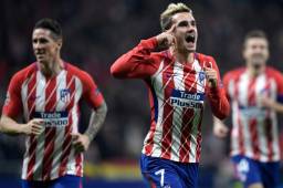 Griezmann abrió la cuenta y tiene al Atlético de Madrid soñando con clasificar a los octavos de Champions. Fotos AFP