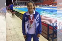 La hondureña Michelle Ramírez posa emocionada con su medalla de oro obtenida en los CCCAN.