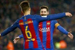 Denis Suárez y Messi festejando juntos con el Barcelona.