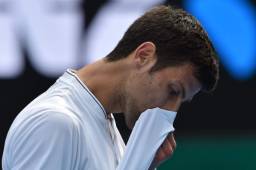 Djokovic, segundo cabeza de serie, gran dominador de este torneo en esta década, sucumbió ante Istomin, en cuatro horas y 48 minutos. Fotos AFP