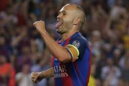 Andres Iniesta celebrando con el Barcelona.