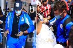 Olimpia arribó a Tegucigalpa y no fue ajeno a la amenaza del coronavirus. Johnny Leverón y Matías Garrido llegaron con mascarillas a la terminal aérea.