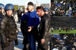 El campo del Olympique de Lyon fue invadido hoy y posteriormente desalojado por las fuerzas del orden tras una pelea entre aficionados del equipo local y del Besiktas, que obligó a retrasar el inicio del encuentro 45 minutos.