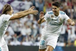 Asensio celebrando su anotación con Modric.