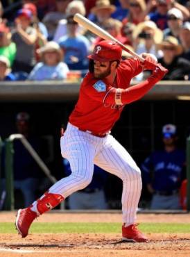 (FILES) In this file photo taken on March 9, 2019 Bryce Harper #3 of the Philadelphia Phillies hits in the first inning during a game against the Toronto Blue Jays in Clearwater, Florida. - Philadelphia Phillies outfielder Bryce Harper has the most popular jersey in Major League Baseball, according to online sales details revealed on March 28, 2019 by the league. Harper signed a 13-year, $330 million contract with the Phillies on March 2 after spending his first seven seasons with the Washington Nationals. (Photo by Mike Ehrmann / GETTY IMAGES NORTH AMERICA / AFP)