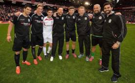 Liverpool's Brazilian midfielder Roberto Firmino celebrates after scoring a goalduring the English Premier League football match between Liverpool and Leicester City at Anfield in Liverpool, north west England on November 22, 2020. (Photo by Jon Super / POOL / AFP) / RESTRICTED TO EDITORIAL USE. No use with unauthorized audio, video, data, fixture lists, club/league logos or 'live' services. Online in-match use limited to 120 images. An additional 40 images may be used in extra time. No video emulation. Social media in-match use limited to 120 images. An additional 40 images may be used in extra time. No use in betting publications, games or single club/league/player publications. /