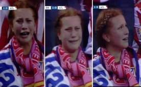 El momento en el que la aficionada del Atlético de Madrid rompe en llanto al ver que Ramos pone en ventaja al Real Madrid.