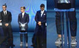 La mirada de Cristiano Ronaldo. ¿Viendo el suelo u observando el traje del francés?